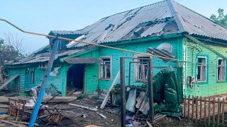 This photo released by the acting Governor of Kursk region Alexei Smirnov telegram channel on Tuesday, Aug. 6, 2024, shows a damaged house after shelling by the Ukrainian side in the city of Sudzha, Kursk region that borders Ukraine.