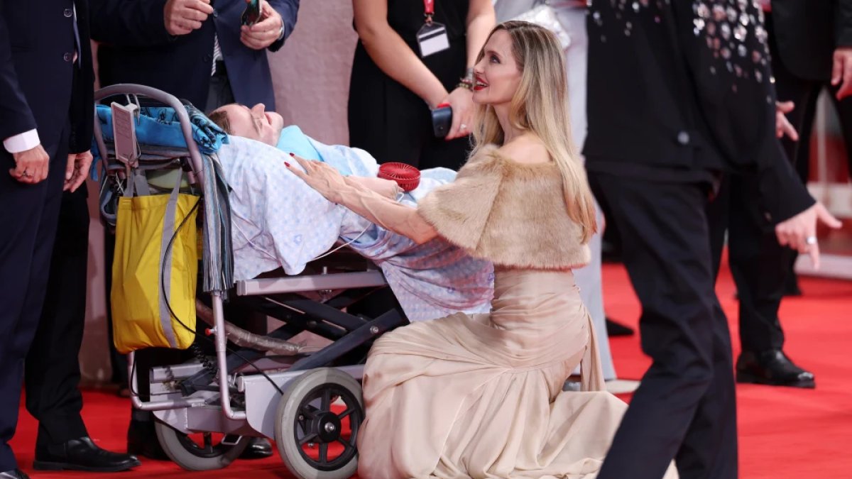 Angelina Jolie stops to greet fan with rare bone disorder during red carpet for ‘Maria'