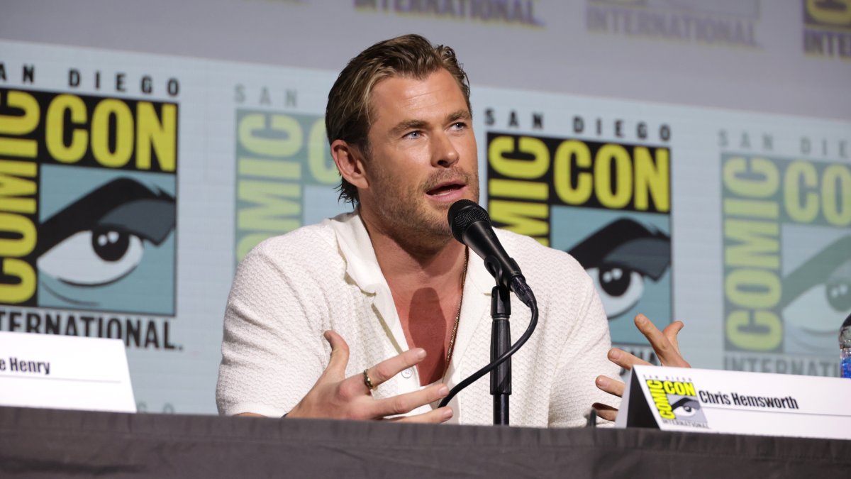 Chris Hemsworth shows off his drum skills in surprise guest appearance at Ed Sheeran's concert