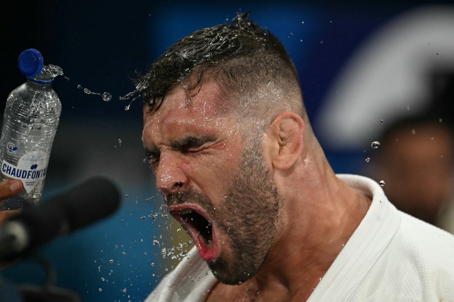 Israel's Peter Paltchik reacts after beating France's Aurelien Diesse in the judo men's -100kg round of 16 bout of the Paris 2024 Olympic Games at the Champ-de-Mars Arena, in Paris on August 1, 2024