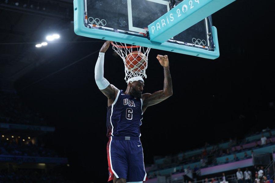 LeBron James dunks the ball