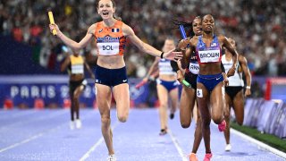 Netherlands’ Femke Bol and US’ Kaylyn Brown compete in the mixed 4x400m relay final of the athletics event at the Paris 2024 Olympic Games at Stade de France in Saint-Denis, north of Paris, on August 3, 2024. (Photo by Jewel SAMAD / AFP) (Photo by JEWEL SAMAD/AFP via Getty Images)