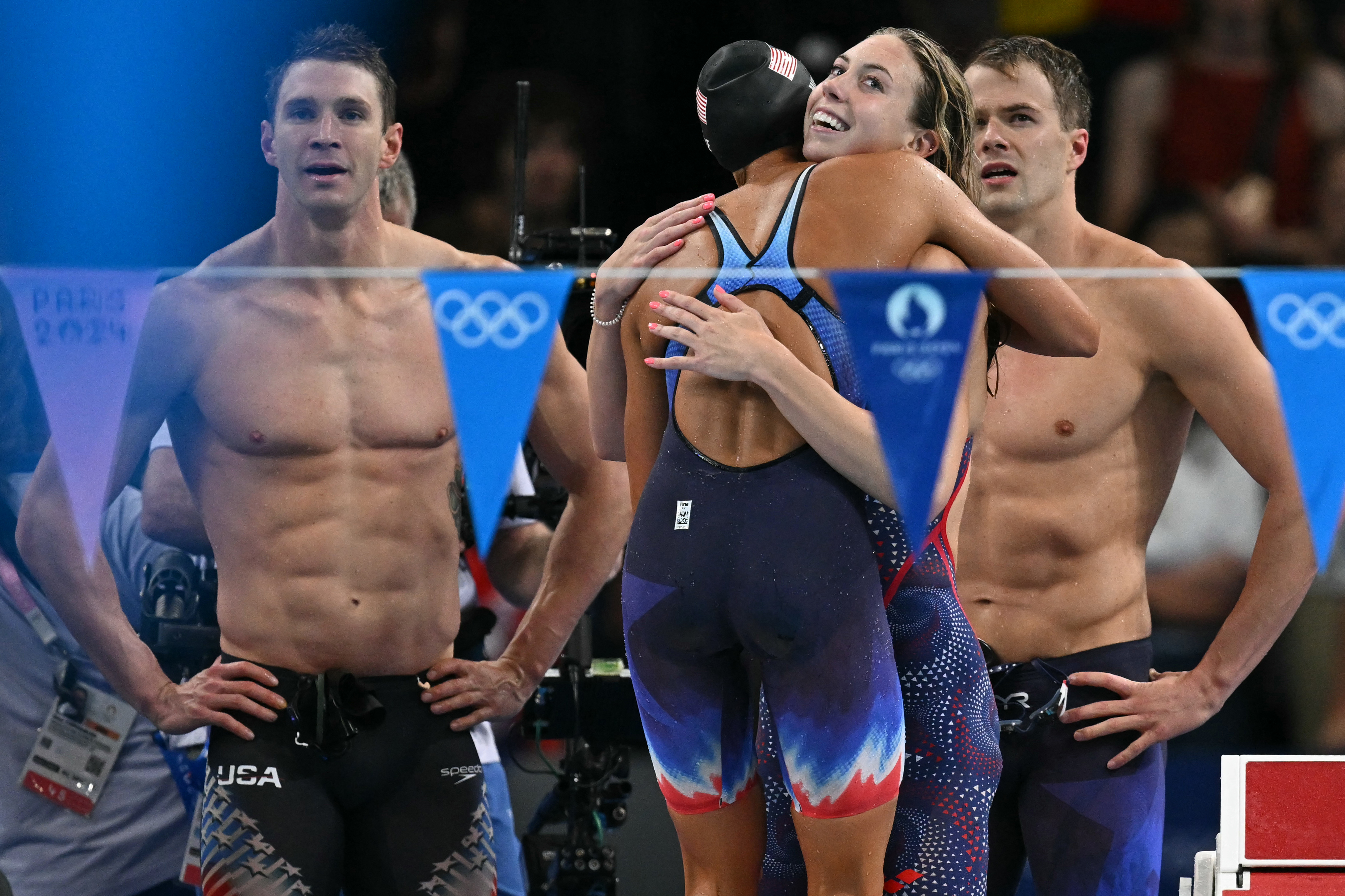 U.S. stars team up for mixed medley relay gold, world record – NBC