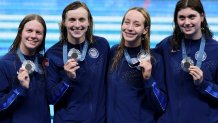 NANTERRE, FRANCE - AUGUST 01: Silver Medalists Claire Weinstein, Paige Madden, Katie Ledecky and Erin Gemmell of Team United States pose following the Swimming medal ceremony after the Women's 4x200m Freestyle Relay Final on day six of the Olympic Games Paris 2024 at Paris La Defense Arena on August 01, 2024 in Nanterre, France. (Photo by Clive Rose/Getty Images)