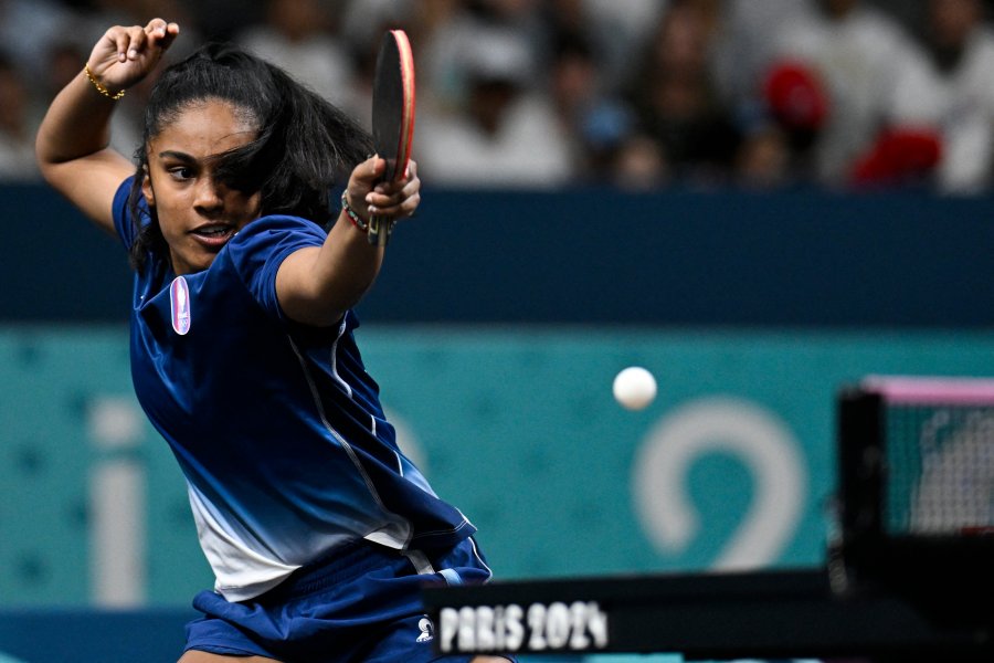 France's Prithika Pavade returns the ball during her women's table tennis singles match in the team round of 16 between France and Thailand at the Paris 2024 Olympic Games at the South Paris Arena in Paris on August 5, 2024