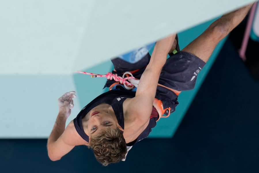 An overview shows Britain's Toby Roberts competing in the men's sport climbing lead semi final during the Paris 2024 Olympic Games at Le Bourget Sport Climbing Venue in Le Bourget on August 7, 2024