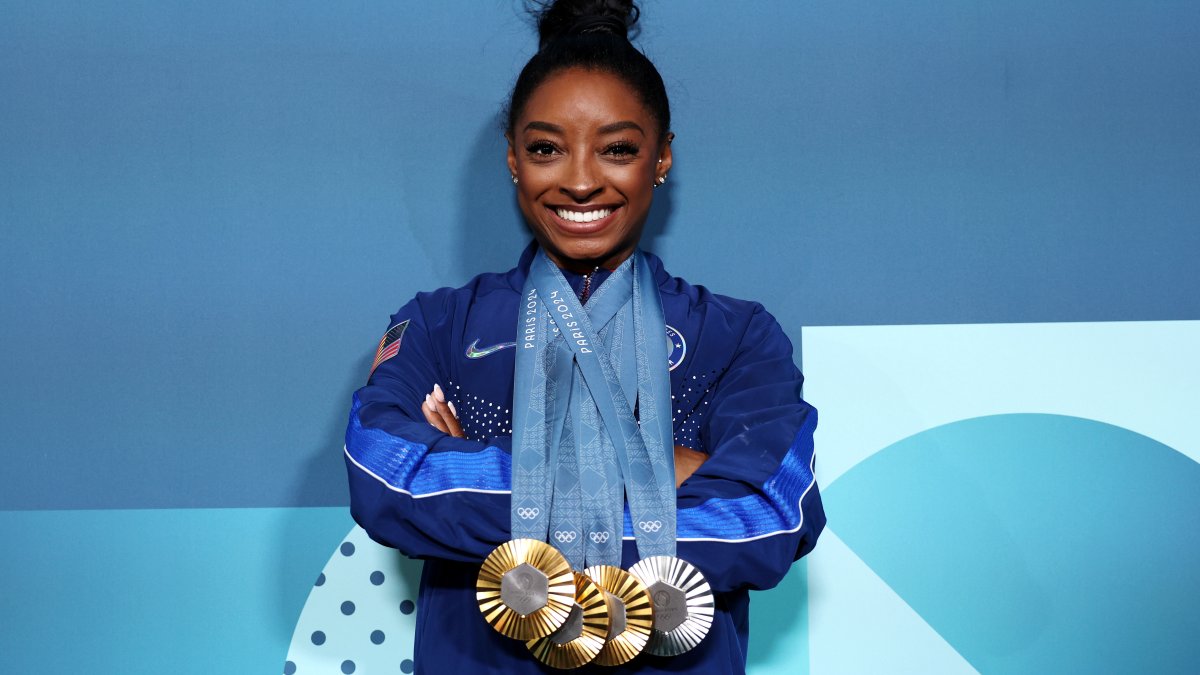 Simone Biles poses with her 11 Olympic medals in new photos – NBC 6 ...