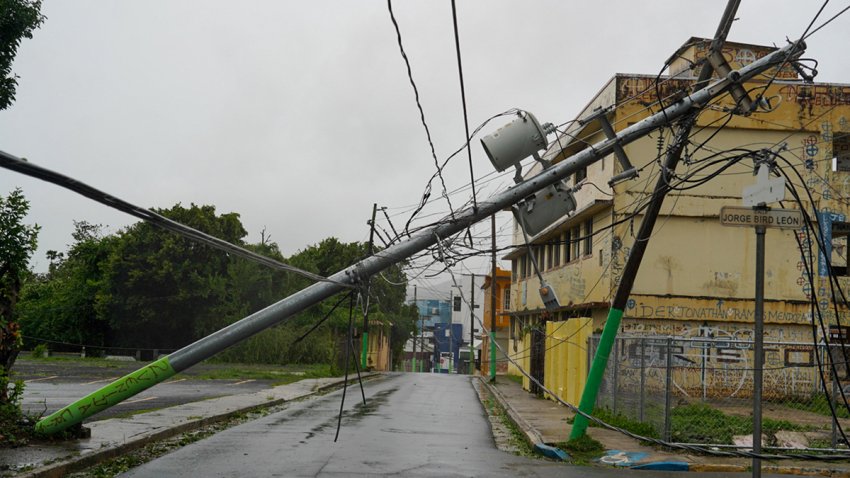 TOPSHOT – Broken electricity lines above homes damaged are seen after Tropical Storm Ernesto hit Fajardo, Puerto Rico, on August 14, 2024. On August 13, Ernesto advanced through the Caribbean toward Puerto Rico, where officials shut down schools and sent workers home as forecasters warned of a possible hurricane.
The storm was moving west toward the US island with maximum sustained winds of 50 miles per hour (85kph), according to the National Hurricane Center. (Photo by Jaydee Lee SERRANO / AFP) (Photo by JAYDEE LEE SERRANO/AFP via Getty Images)