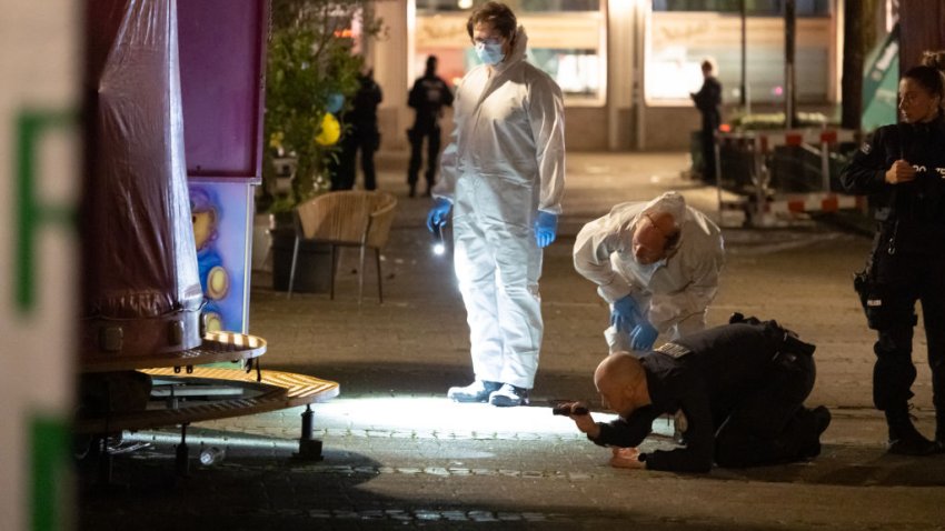 Investigators in Solingen, Germany.