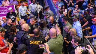 A man is apprehended at Trump rally