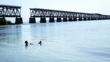 A man in the water at Bahia Honda State Park. (Photo by: Jeffrey Greenberg/Universal Images Group via Getty Images)