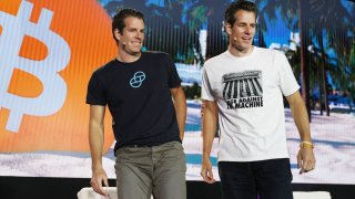 Tyler Winklevoss and Cameron Winklevoss (L-R), creators of crypto exchange Gemini Trust Co., on stage at the Bitcoin 2021 Convention, a cryptocurrency conference held at the Mana Convention Center in Wynwood in Miami, Florida, on June 4, 2021.