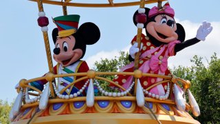 The Mickey Mouse and Minnie Mouse float passes by during the daily Festival of Fantasy Parade at the Magic Kingdom Park at Walt Disney World on May 31, 2024, in Orlando, Florida. 