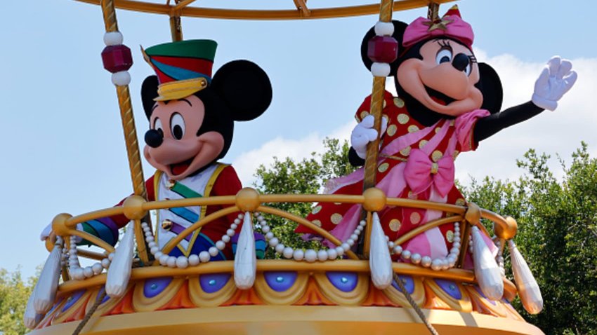 The Mickey Mouse and Minnie Mouse float passes by during the daily Festival of Fantasy Parade at the Magic Kingdom Park at Walt Disney World on May 31, 2024, in Orlando, Florida. 