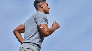 A man wearing Abbott’s Lingo biosensor.