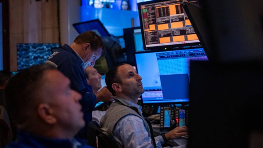 Traders work on the New York Stock Exchange floor on Sept. 9, 2024.