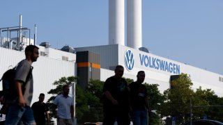 Employees leave the Volkswagen plant in Zwickau after a works meeting. Europe’s largest car manufacturer had announced that, in view of the worsening situation, it would once again tighten its austerity measures at the core VW brand.