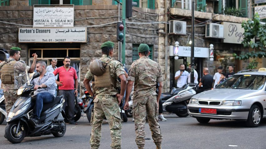 Lebanese army soldiers stand guard near a hospital (not pictured) in Beirut on September 17, 2024, after explosions hit locations in several Hezbollah strongholds around Lebanon amid ongoing cross-border tensions between Israel and Hezbollah fighters.