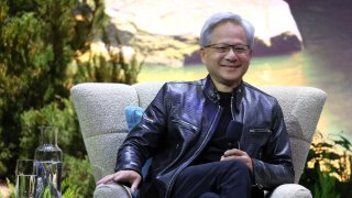 Nvidia CEO Jensen Huang talks onstage with Salesforce CEO Marc Benioff during Salesforce’s Dreamforce in San Francisco on Sept. 17, 2024.