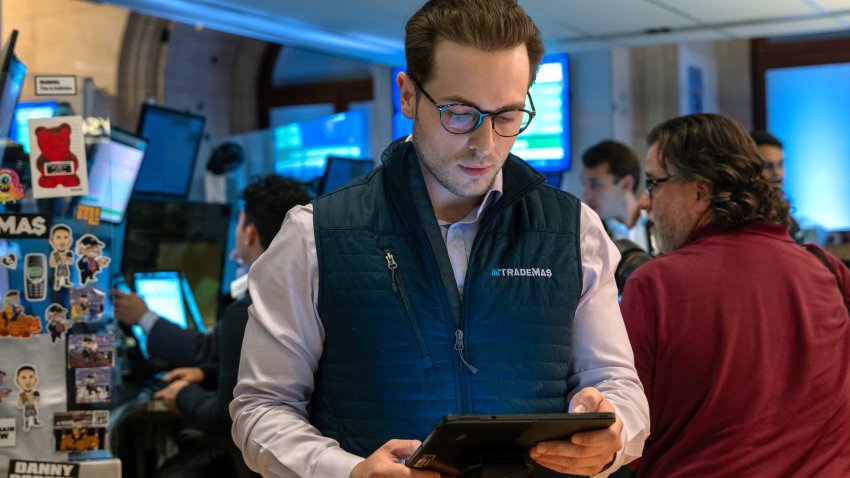 Traders work on the floor of the New York Stock Exchange (NYSE) on September 19, 2024, in New York City. 