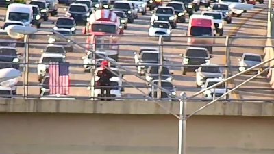 Video shows clown waving possible weapon on bridge over Palmetto Expressway