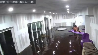 ‘5-and-a-half feet of water in my living room': Tampa man rides kayak in flooded home