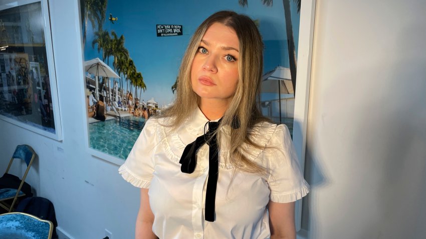 FILE – Anna Delvey, also known as Anna Sorokin, poses at her apartment in New York, May 26, 2023, to promote her podcast, “The Anna Delvey Show.” (AP Photo/John Carucci, File)