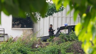 Police guard Argentina’s embassy in Caracas, Venezuela, Saturday, Sept. 7, 2024.