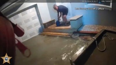 Police bodycam video shows man rescued from floodwaters in Fort Myers Beach