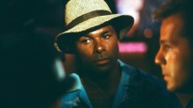 MIAMI VICE -- "No Exit" Episode 7 -- Air Date 11/09/1984 -- Pictured: Philip Michael Thomas as Detective Ricardo 'Rico' Tubbs, Bruce Willis as Tony Amato (Photo by NBCU Photo Bank/NBCUniversal via Getty Images via Getty Images)