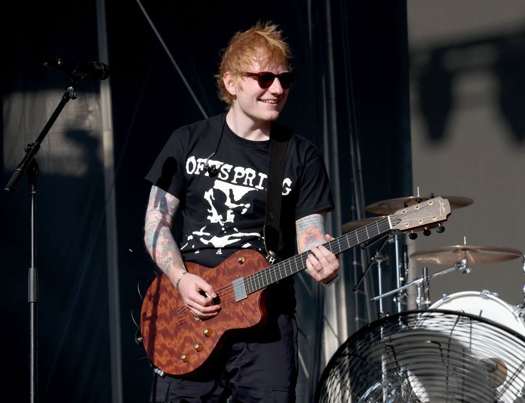Watch Ed Sheeran serenade a runner while he floats on a boat nearby