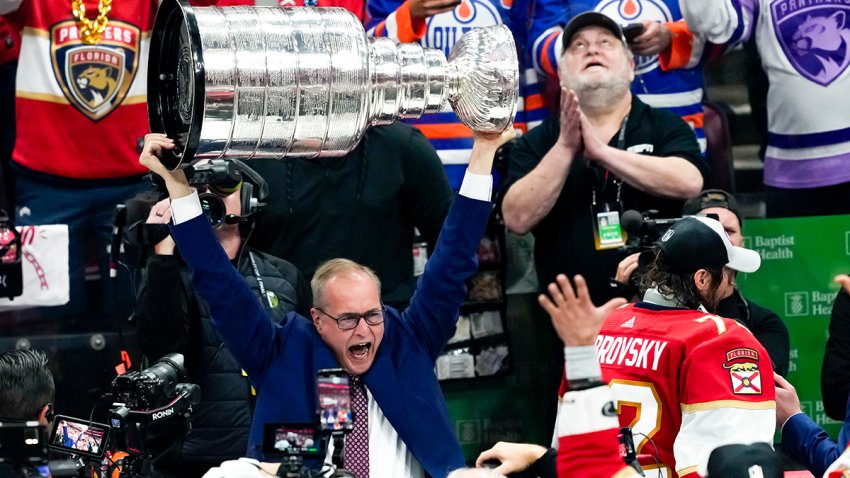 SUNRISE, FL – JUNE 24:  Florida Panthers head coach Paul Maurice raises the Stanley Cup  during the NHL Stanley Cup Finals, Game 7 between the Florida Panthers and Edmonton Oilers on June 24th, 2024 at Amerant Bank Arena in Sunrise, FL. (Photo by Andrew Bershaw/Icon Sportswire via Getty Images)