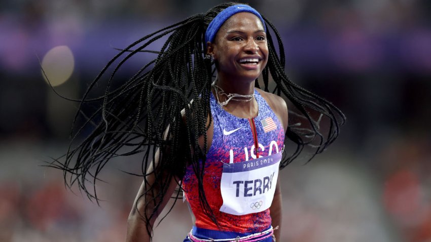 PARIS, FRANCE – AUGUST 09: Twanisha Terry of Team United States celebrates winning the gold medal after competing in the Women’s 4x100m Relay Final on day fourteen of the Olympic Games Paris 2024 at Stade de France on August 09, 2024 in Paris, France. (Photo by Christian Petersen/Getty Images)