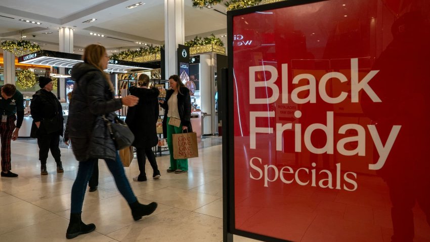 Shoppers walk at Macy’s department store during Black Friday shopping in Manhattan in New York City, New York, U.S., November 24, 2023.