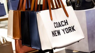 Hand bags are displayed at Macy’s Herald Square store on December 17, 2023 in New York City.