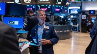 Traders work on the floor of the New York Stock Exchange on April 5, 2024.