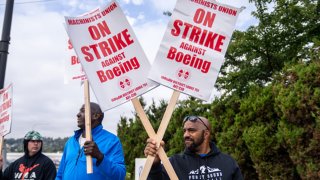 Boeing Machinists union members picket outside a Boeing factory on September 13, 2024 in Renton, Washington. 