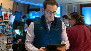 Traders work on the floor of the New York Stock Exchange (NYSE) on September 19, 2024, in New York City.