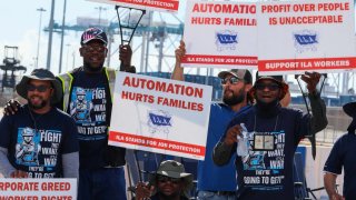 Port of Miami dockworkers strike near the port entrance and demand a new labor contract, on October 1, 2024 in Miami, Florida. 