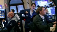 Traders work on the floor of the New York Stock Exchange during afternoon trading on October 03, 2024 in New York City. 