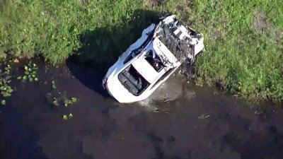 Authorities pull car from canal after woman killed in Cooper City crash