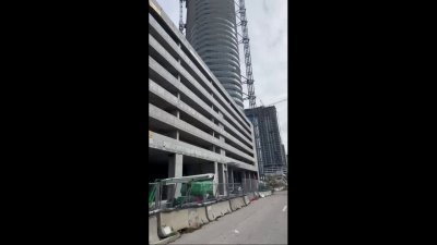 Crane collapses into building in St. Petersburg