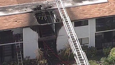 Fire rips through apartment building in NE Miami-Dade