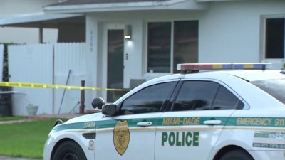 Man in custody after woman found shot in Kendall home