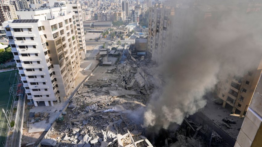 Smoke rises from the site of an Israeli airstrike in Dahiyeh, Beirut, Lebanon, Wednesday, Oct. 2, 2024.