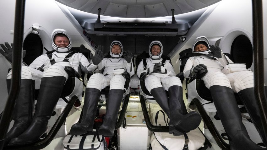 This photo provided by NASA  shows Roscosmos cosmonaut Alexander Grebenkin, left, NASA astronauts Michael Barratt, second from left, Matthew Dominick, second from right, and Jeanette Epps, right, inside the SpaceX Dragon Endeavour spacecraft onboard the SpaceX recovery ship MEGAN shortly after having landed in the Gulf of Mexico off the coast of Pensacola, Florida, Friday, Oct. 25, 2024.