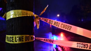 File. Police tape is seen outside the Tree of Life Synagogue after a shooting there left 11 people dead in the Squirrel Hill neighborhood of Pittsburgh on October 27, 2018. – A heavily armed gunman opened fire during a baby-naming ceremony at a synagogue in the US city of Pittsburgh on October 27, killing 11 people and injuring six in the deadliest anti-Semitic attack in recent American history. (Photo by Brendan Smialowski / AFP) (Photo by BRENDAN SMIALOWSKI/AFP via Getty Images)