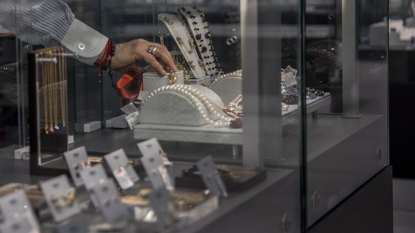 A worker restocks jewelry in a display case at a Sears department store, a subsidiary of Grupo Sanborns SAB, in Mexico City, Mexico, on Monday, Jan. 14, 2019. Mexican Sears, controlled by billionaire Carlos Slim, is completely unrelated to the U.S. company. Sanborns currently operates nearly 100 Sears stores across Mexico. Photographer: Alejandro Cegarra/Bloomberg via Getty Images