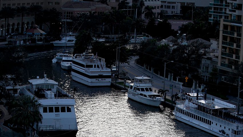 A boat travels on the New River as seen form the Riverside Hotel in Fort Lauderdale, Florida, U.S., on Wednesday, Jan. 18, 2012. Florida will hold its Republican presidential primary on Jan. 31. Photographer: Andrew Harrer/Bloomberg via Getty Images