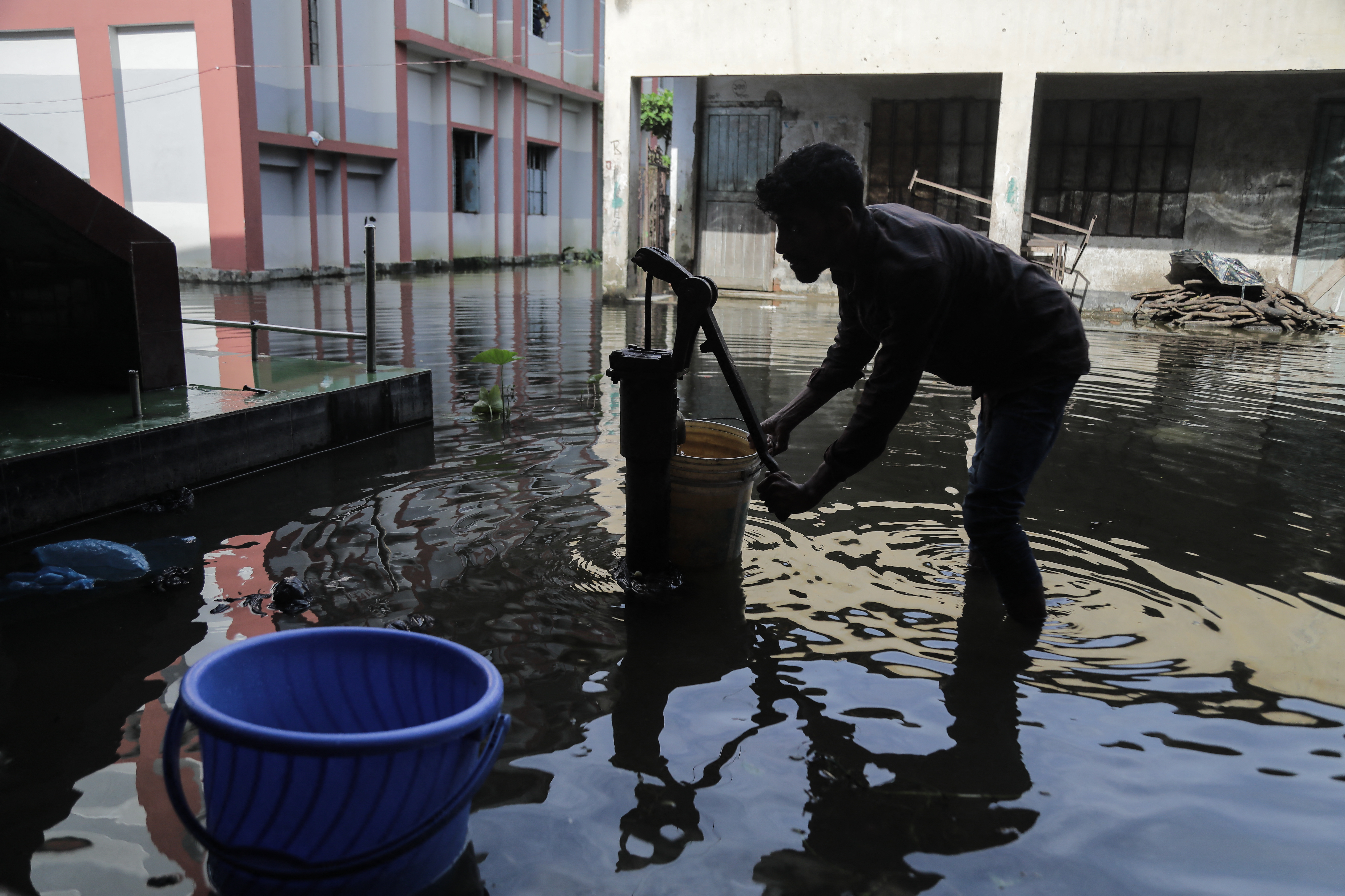 A man tries to collect fresh drinking water 